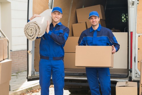 Furniture collection team handling bulky items in a Westminster residential property