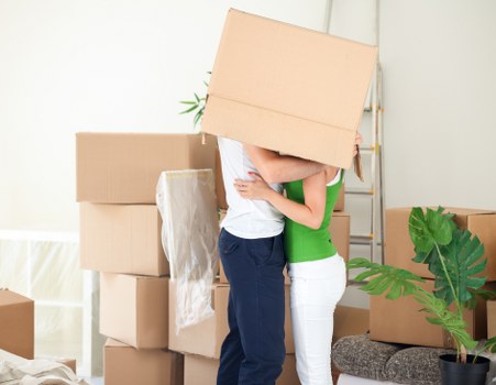 Local moving truck helping with furniture loading in Westminster